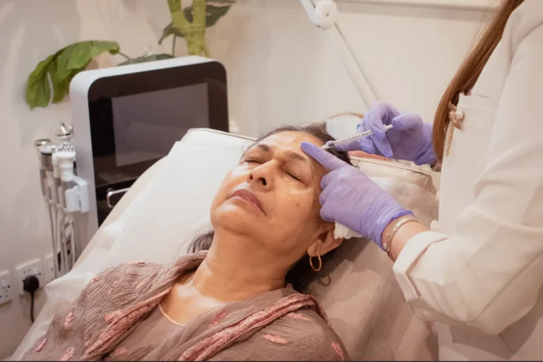 Doctor performing facial dermal filler procedure at Bioflex Aesthetics Pakistan
